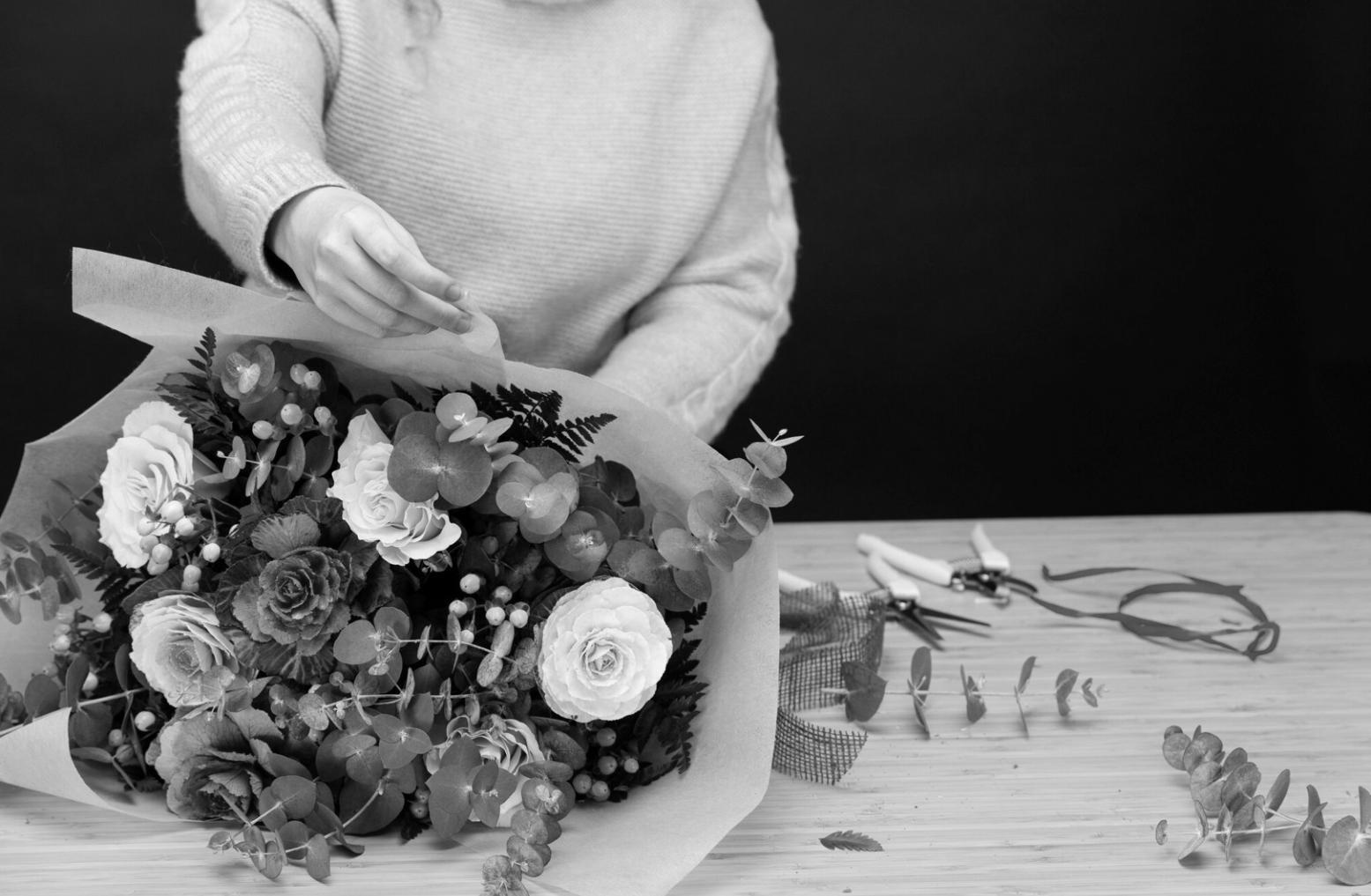 Elegant floral arrangement in modern interior setting showcasing our design philosophy